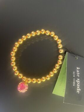 kate spade Gold Beaded Bracelet with Pink Crystal Charm